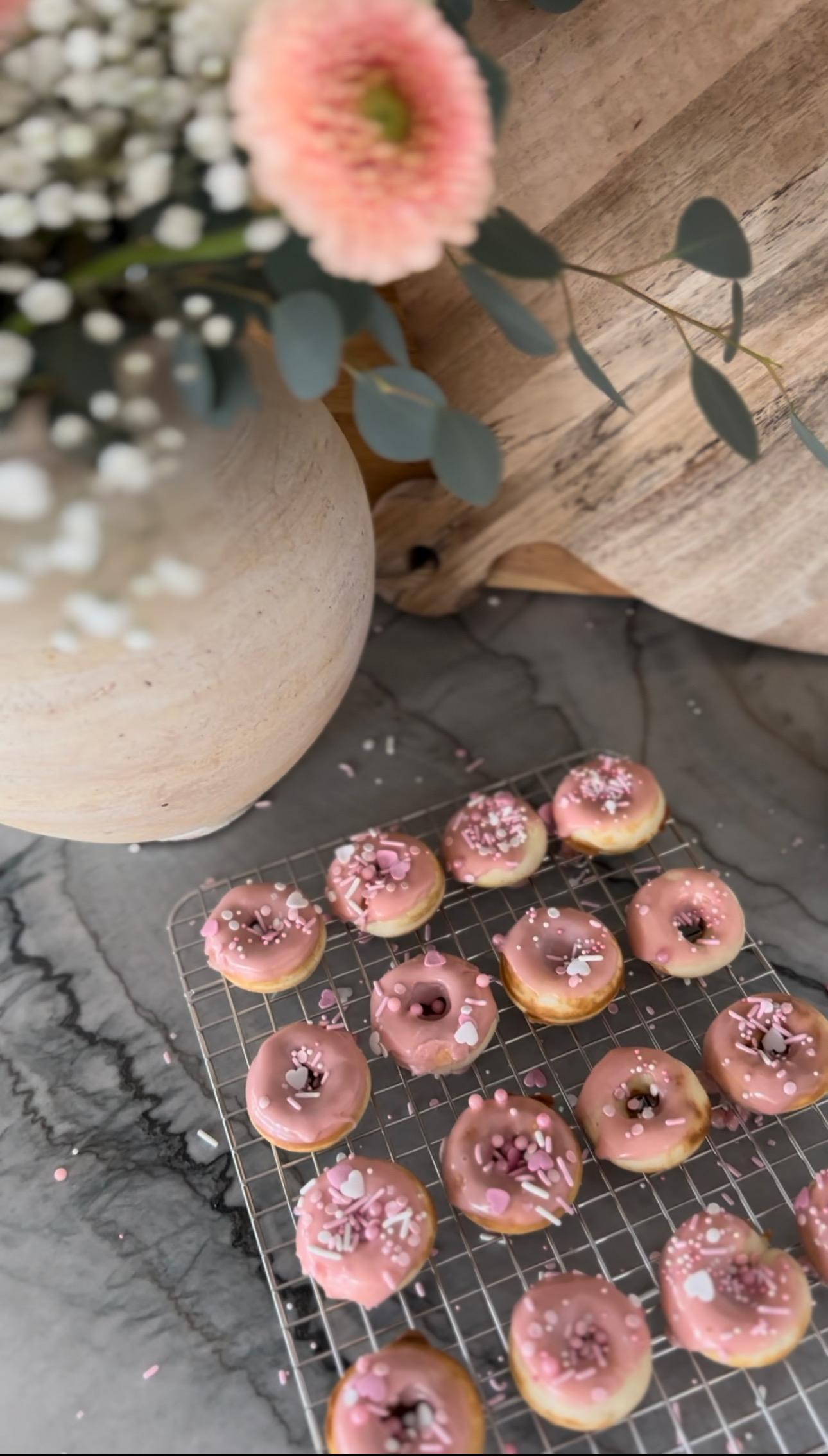 mini donuts, valentine's day, dessert, valentine's treat, donut maker, cooling rack, sprinkles, strawberry icing, dessert ideas 