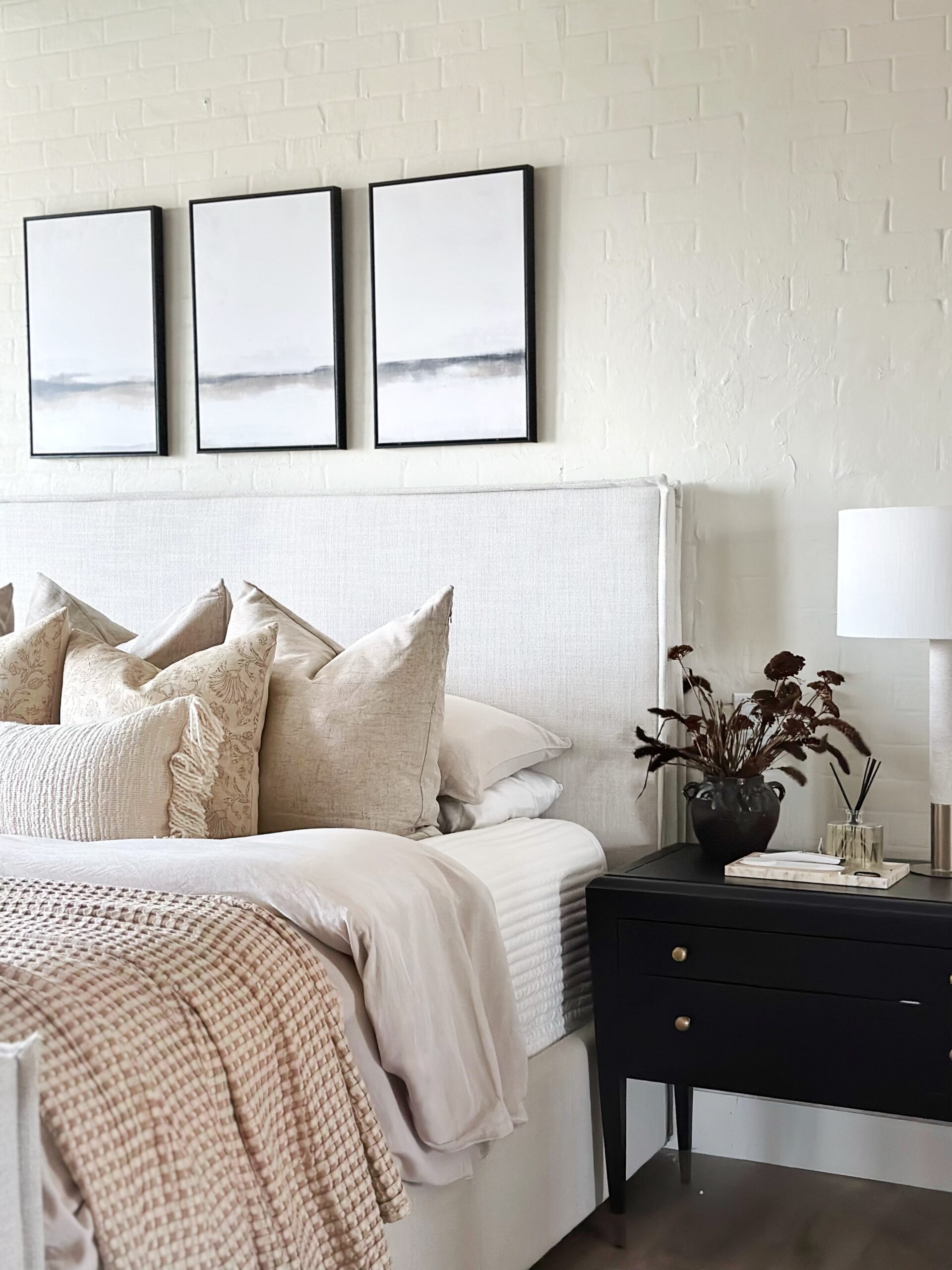 My Bedroom Project | #neutralbedding #whitebrick #wall #bedroomproject #europillows #framedcanvas #area rug #waffleknit #blanket, #homedecor #neutral #decor #quilt #bedding #beige #white #tablelamp
