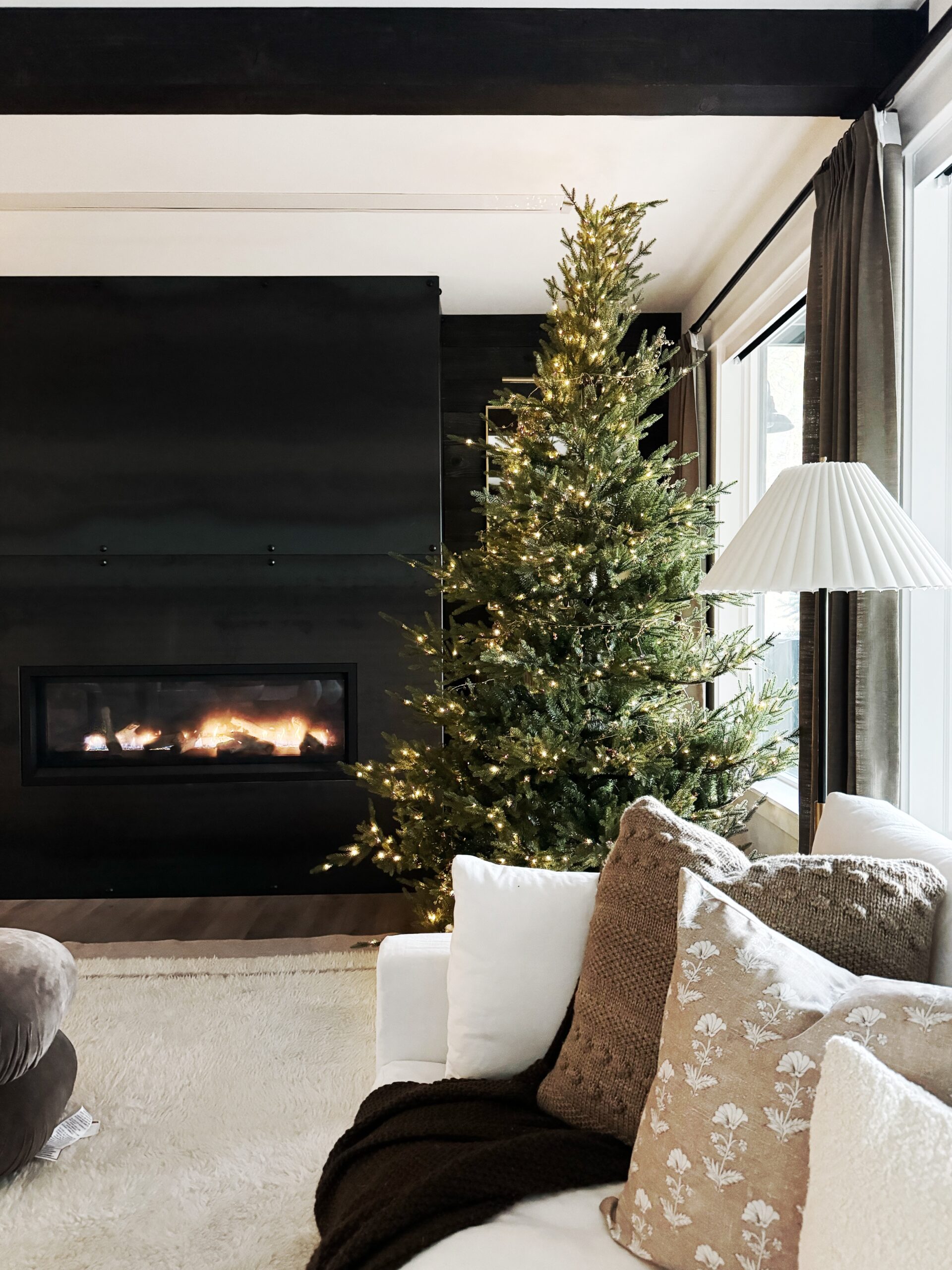 Christmas Trees in My Home | #christmas #christmastree #home #holiday #holidaydecor #seasonaldecor #home #home #homedecor #floorlamp #rug #sofa #pillow #throwpillow #fireplace #basement