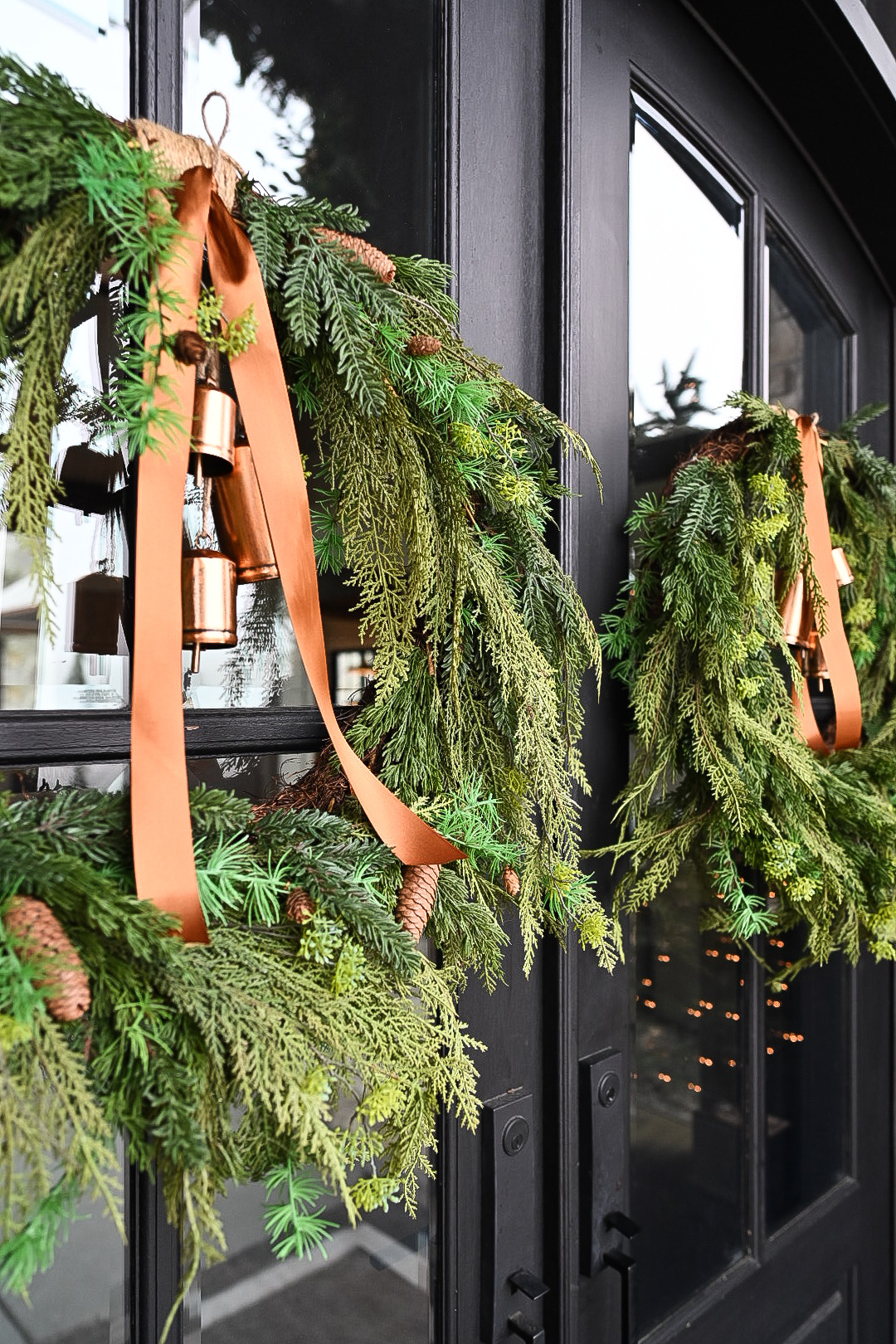holiday home edit | my front porch | #holiday #holidayhome #holidayhomeedit #frontporch #christmas #christmasdecor #christmasdecorideas #christmaswreath #wreath #ribbon #bells #jinglebells #frontdoor