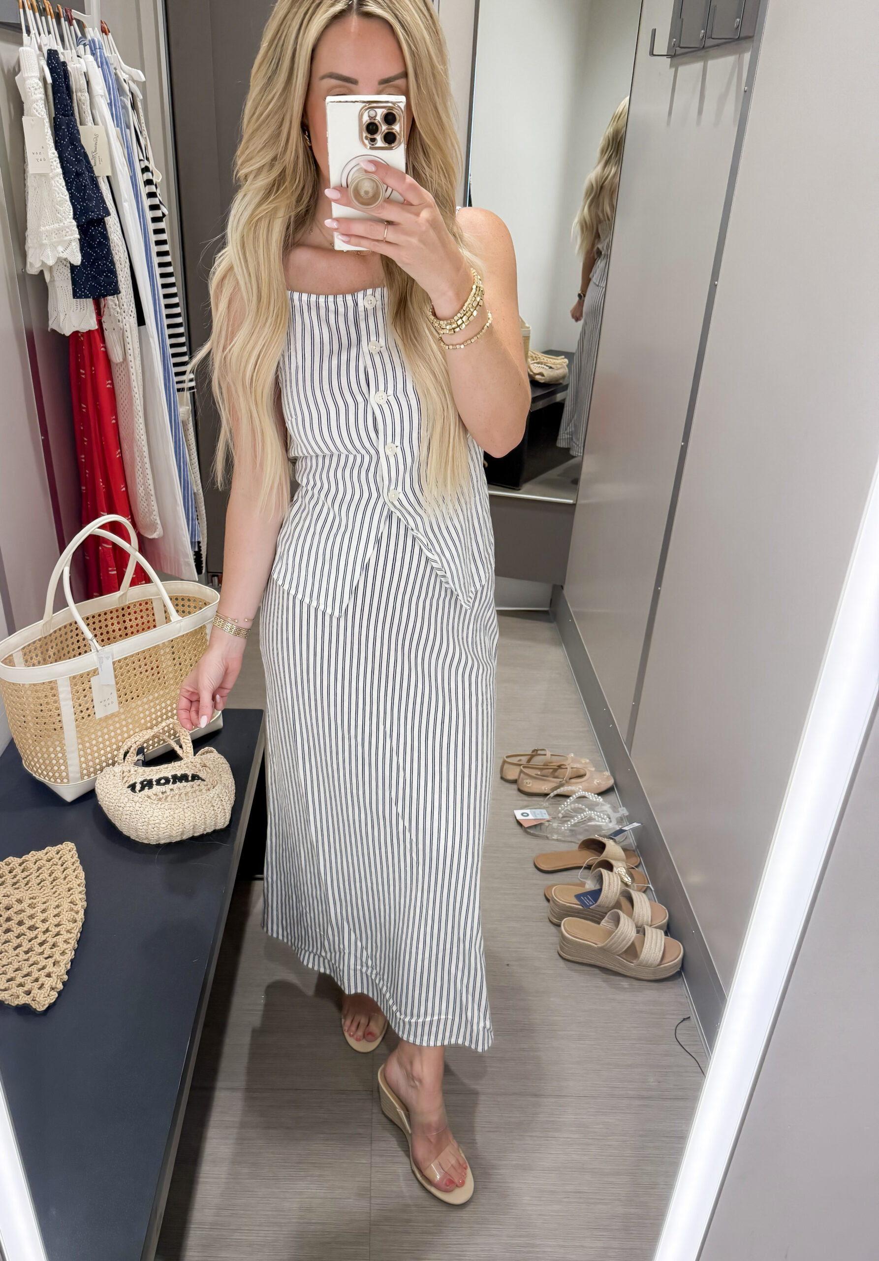 jordyn's summer favorites | woman wearing a striped linen blend vest and matching linen blend skirt in Target fitting room