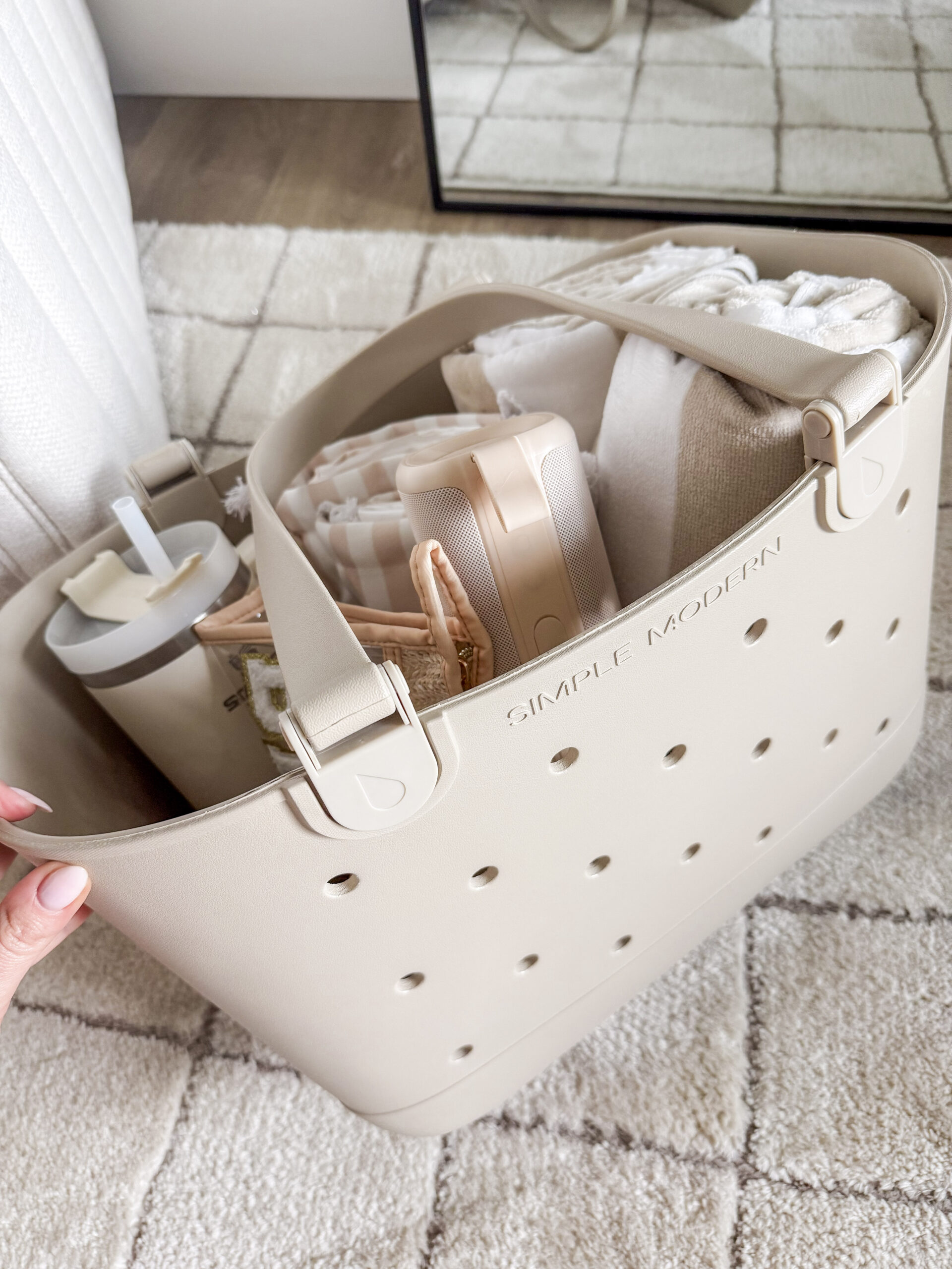 jordyn's summer favorites | image of a large simple modern tote holding several lake day favorites