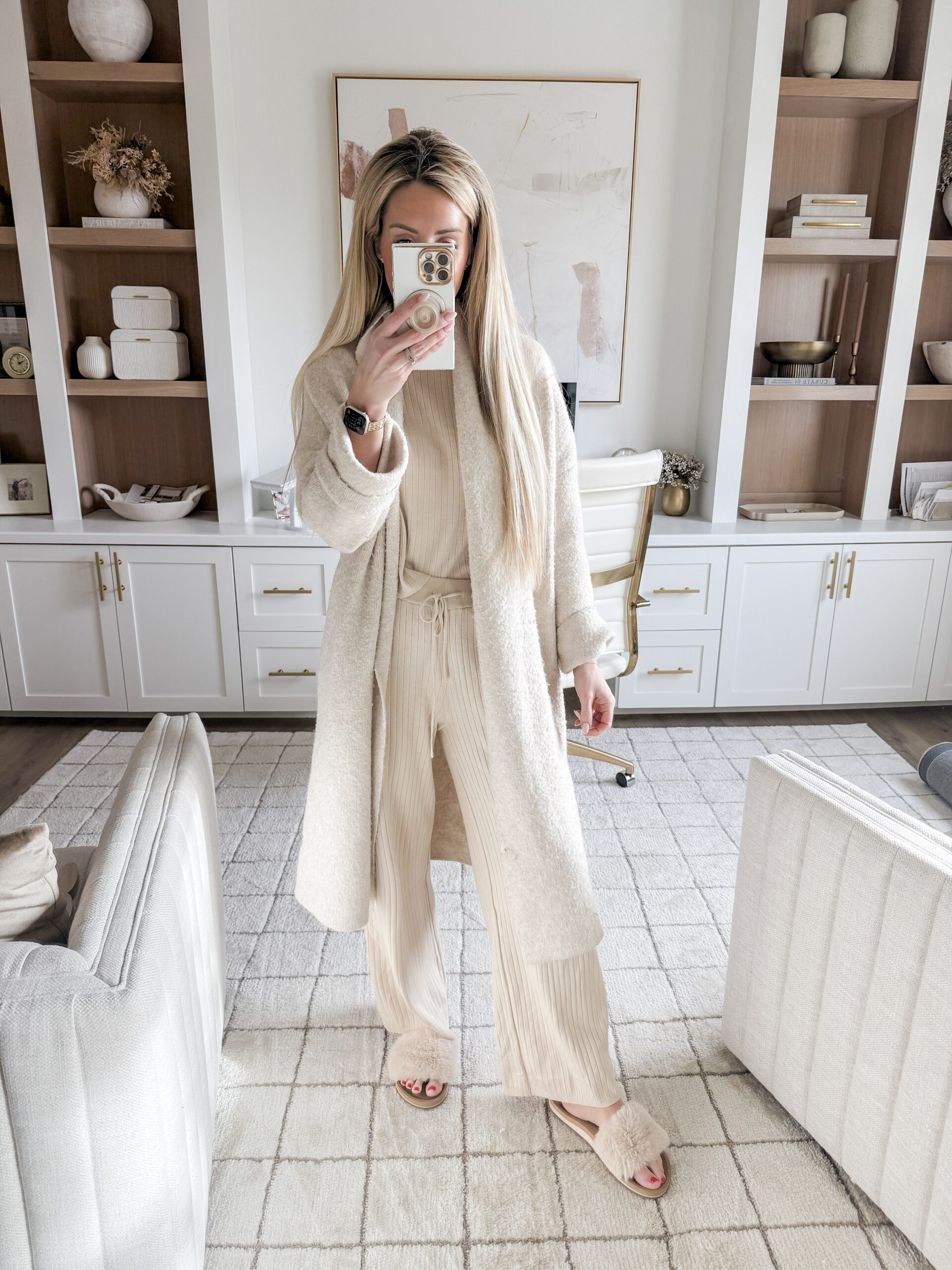image of woman wearing matching set and cardigan