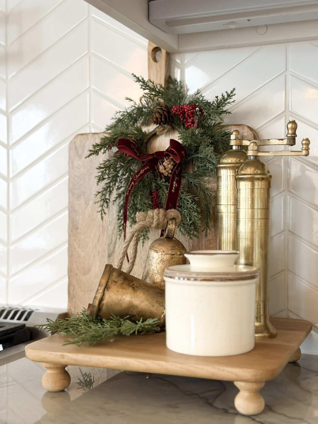 no regret holiday decor | bread board, mini wreath, christmas vignette, bells
