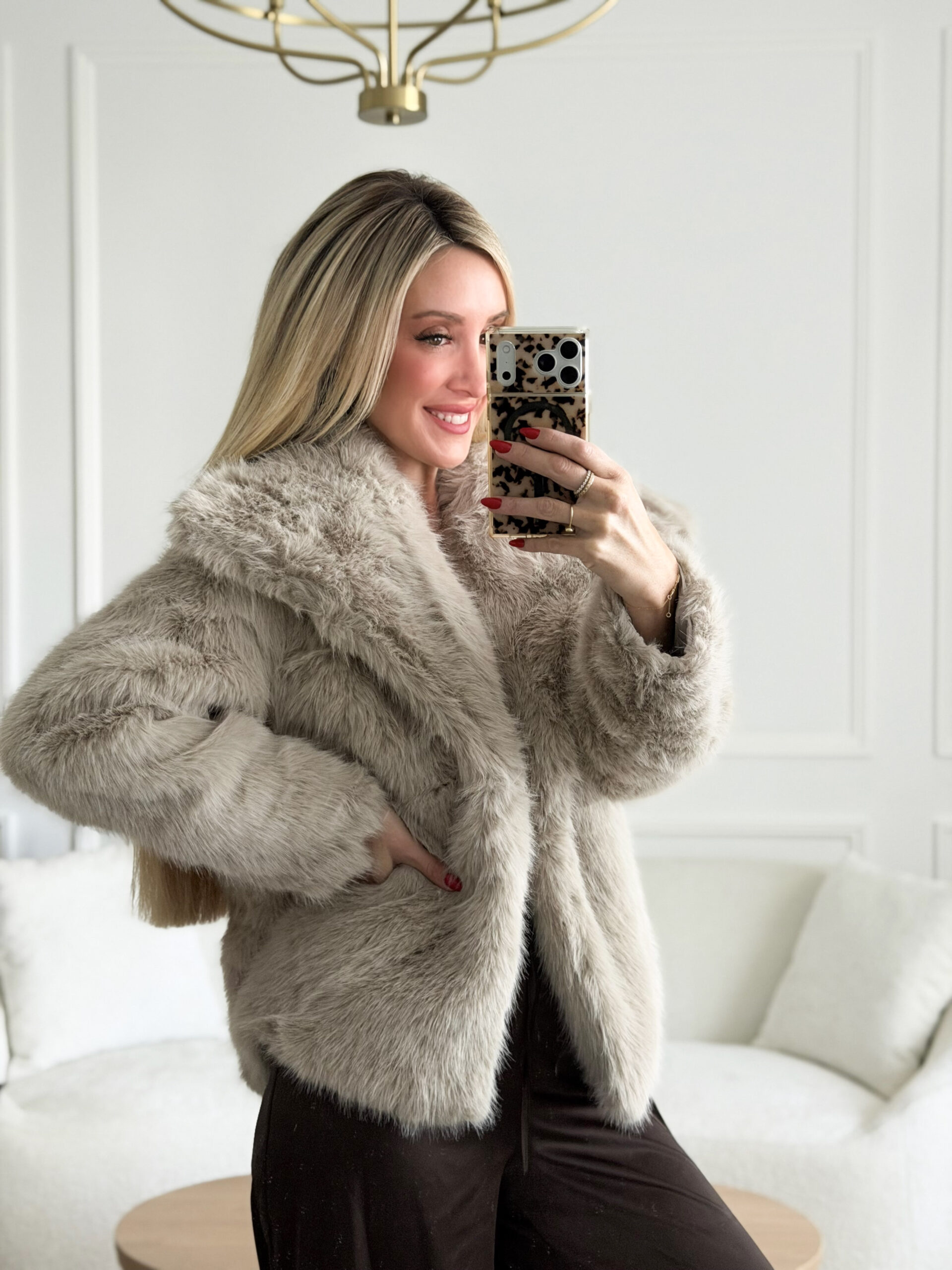 holiday party looks | woman wearing faux fur coat