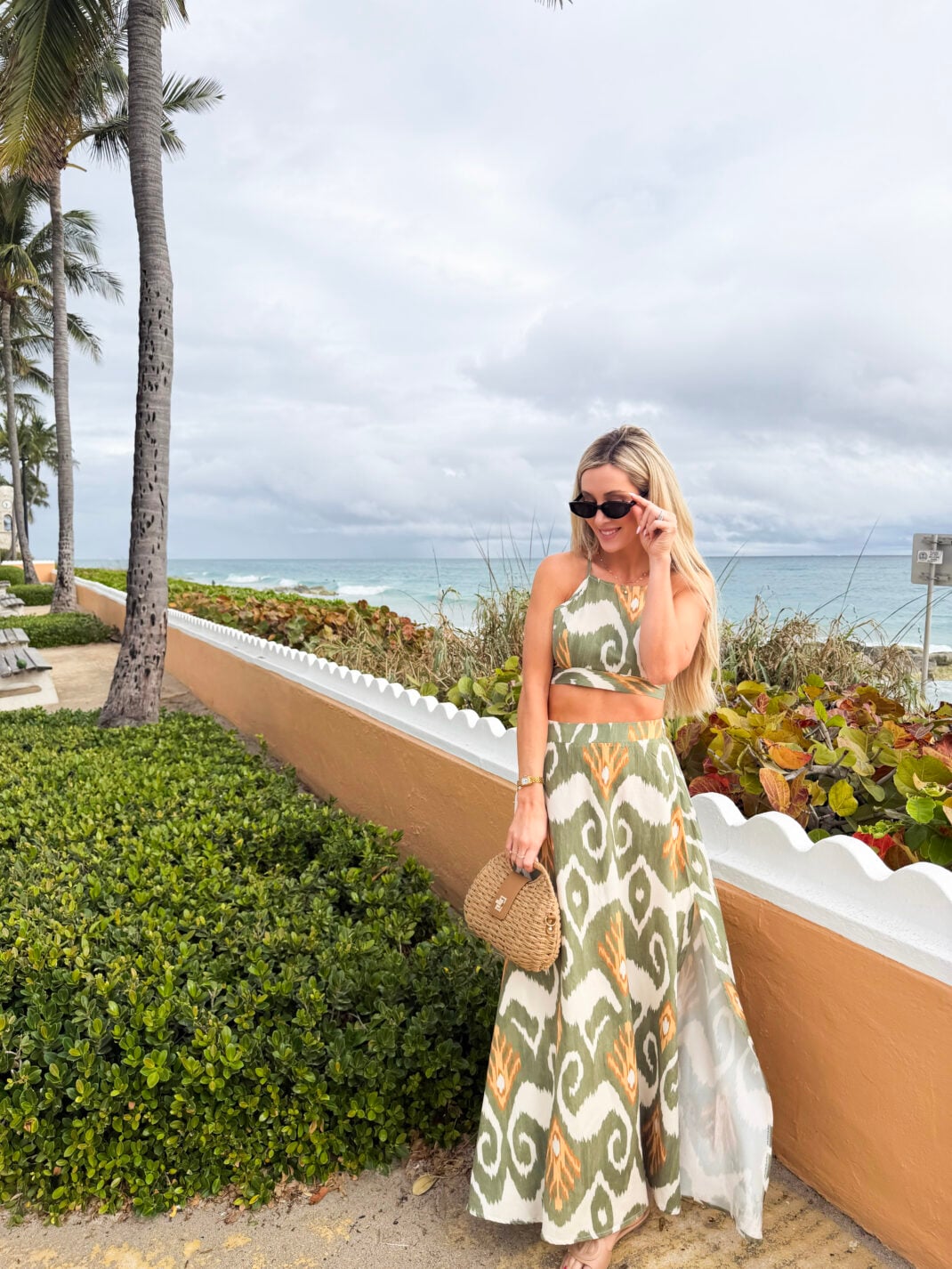 image of woman wearing two piece maxi skirt set on vacation
