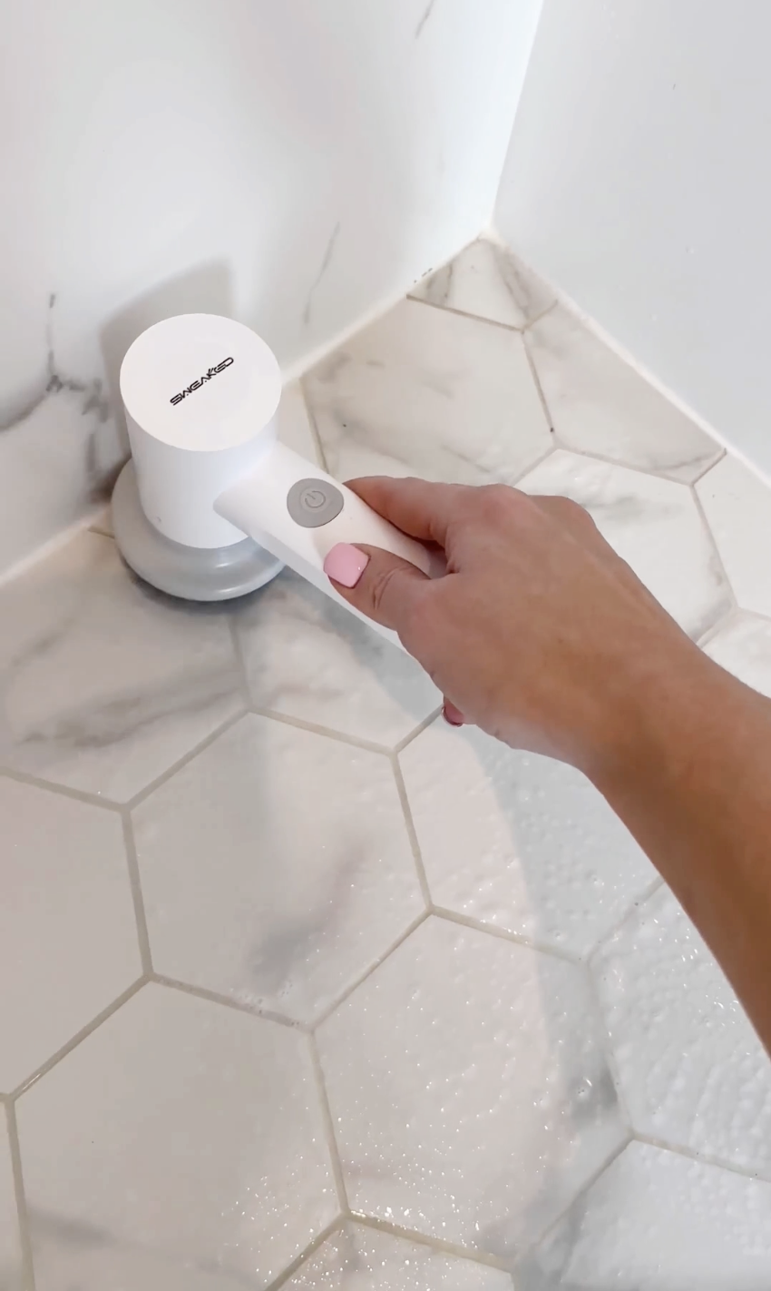 electric spin scrubber cleaning tile