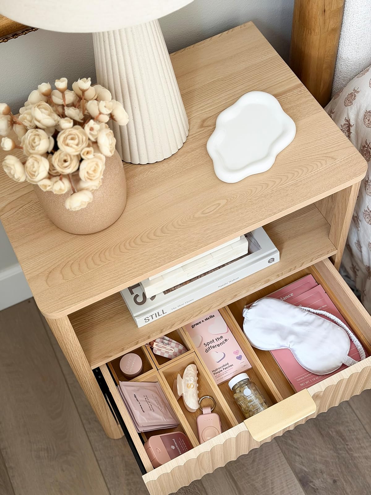 open nightstand drawer with organizers