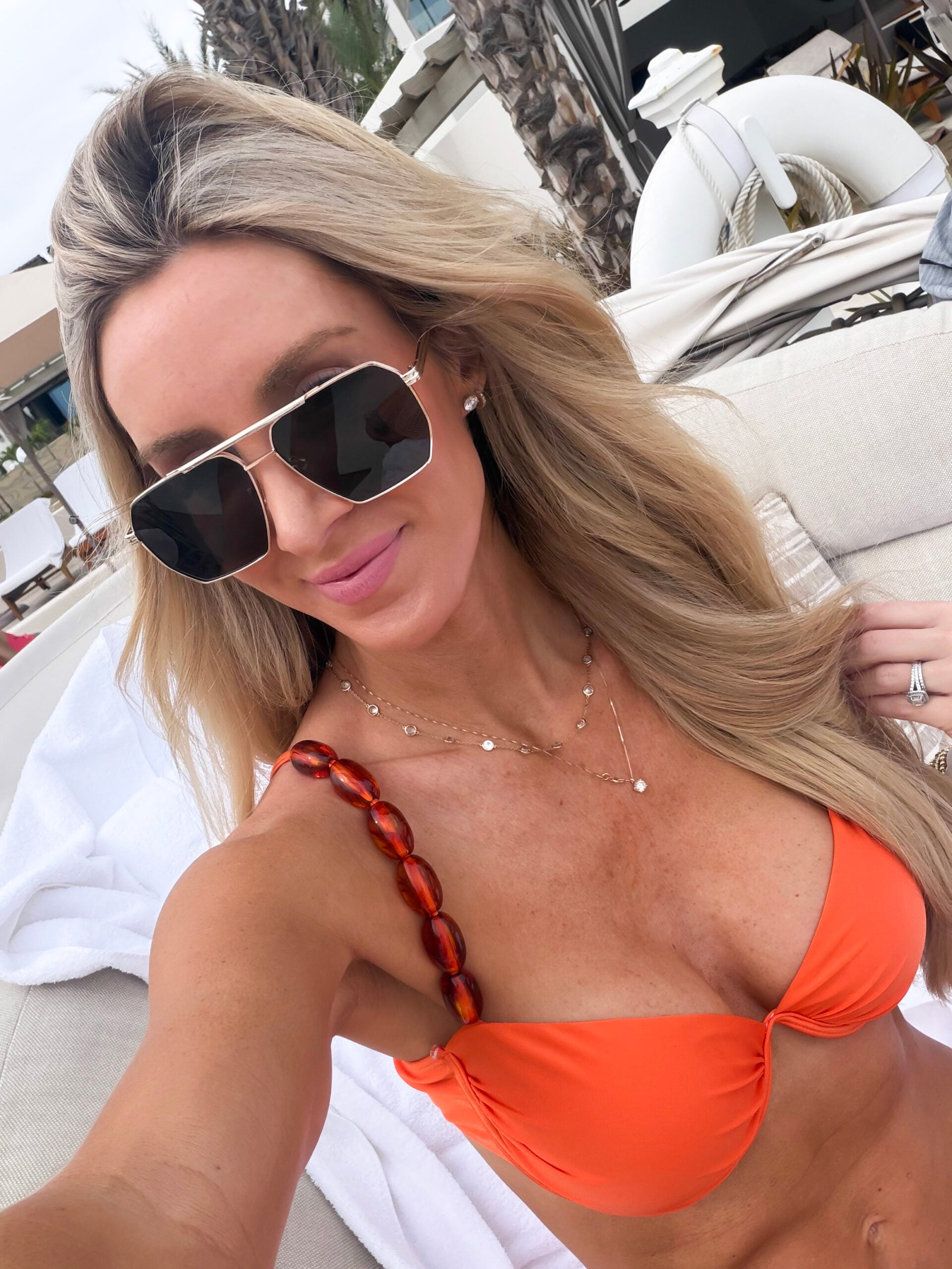 woman in orange bathing suit