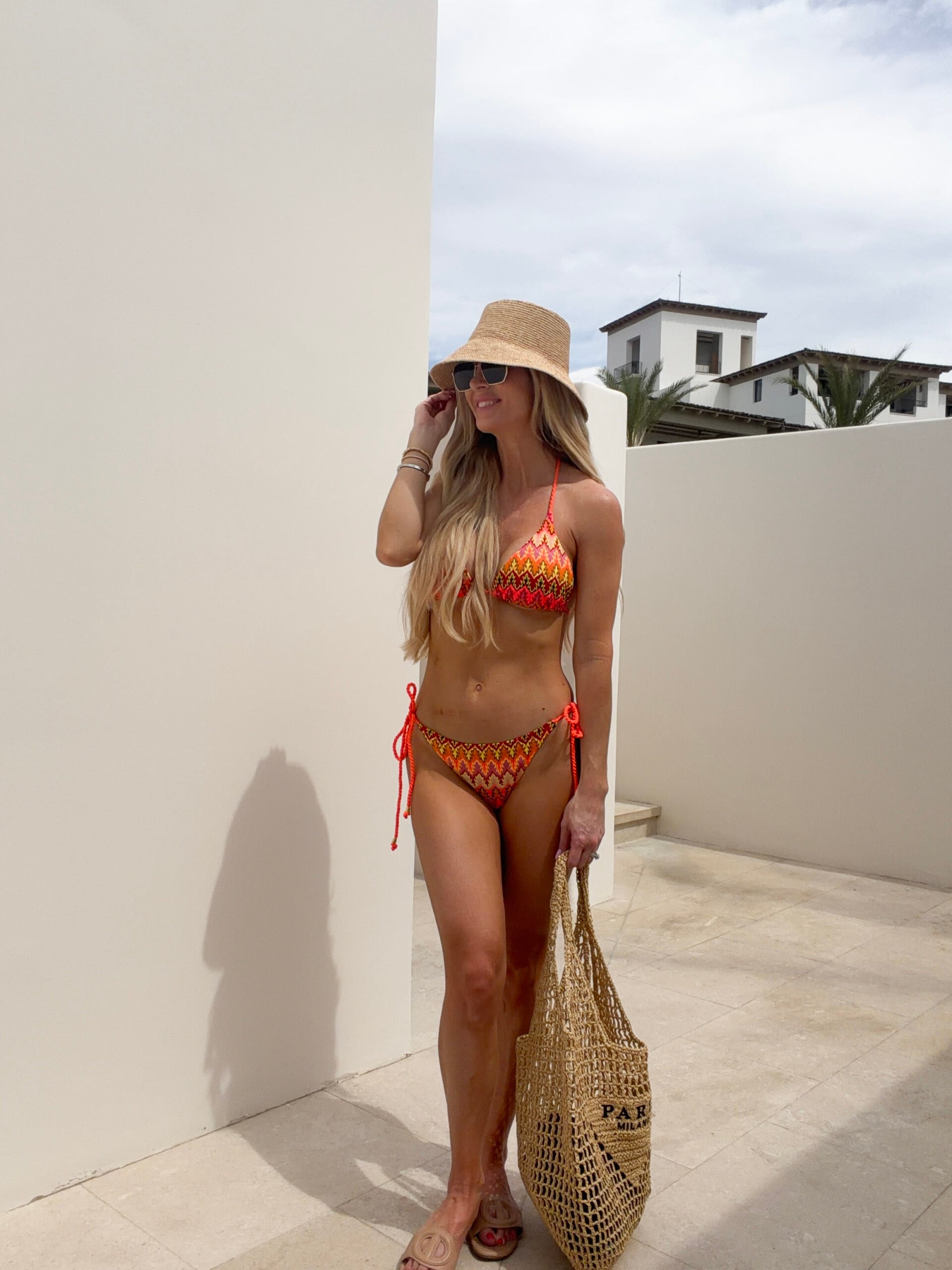 woman in neon printed bikini