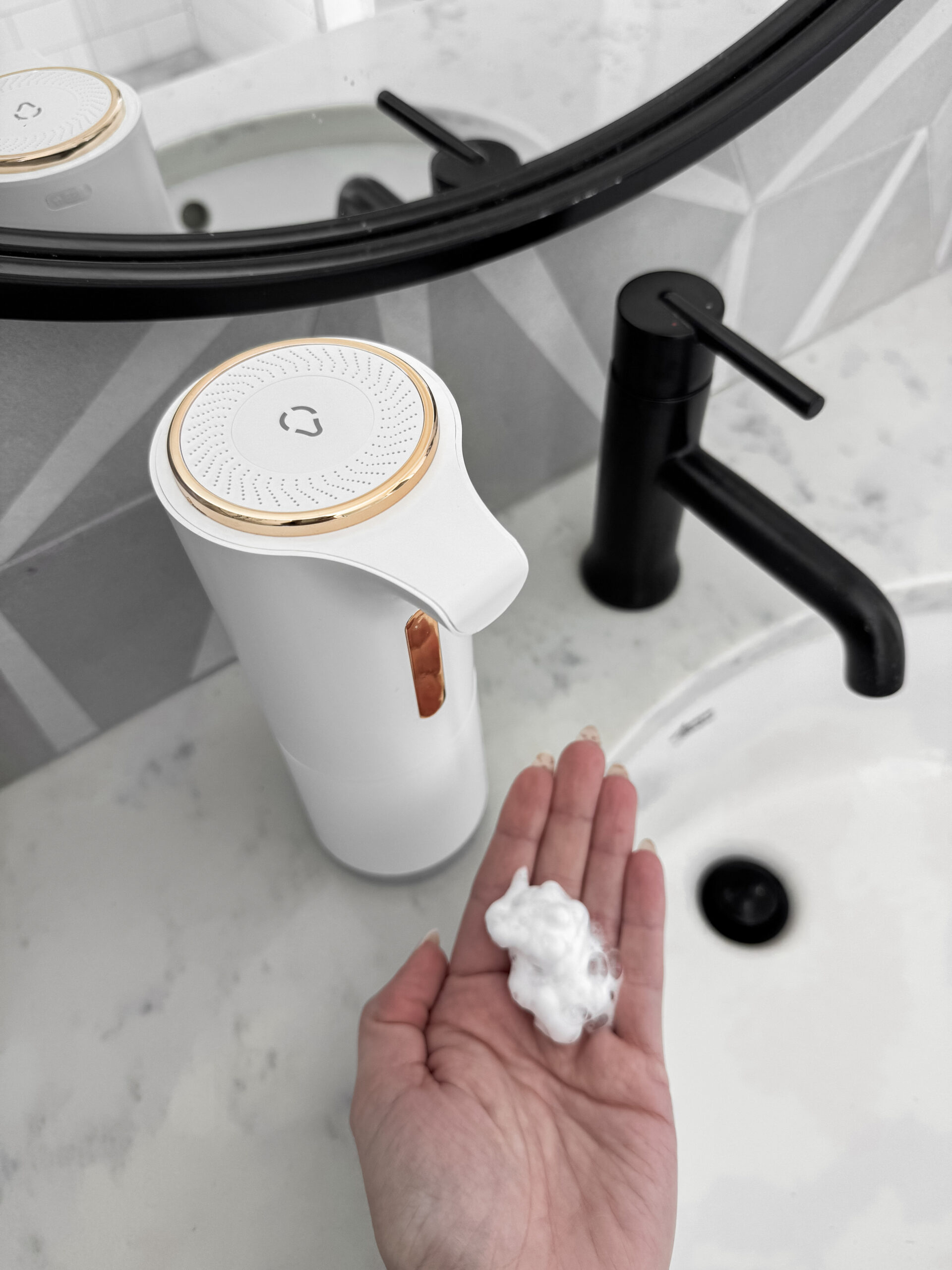 automatic soap dispenser on counter