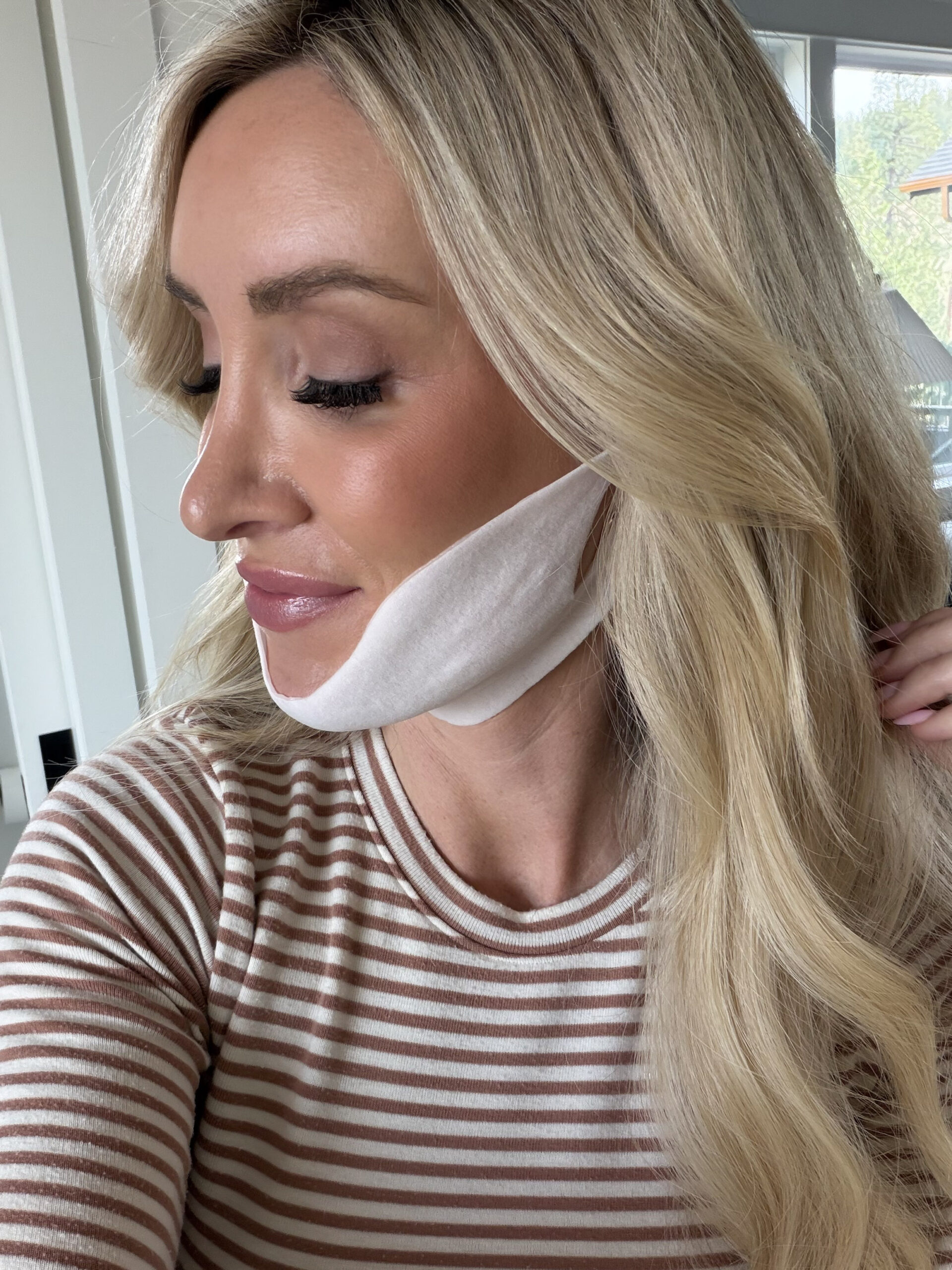 woman wearing chin skincare mask