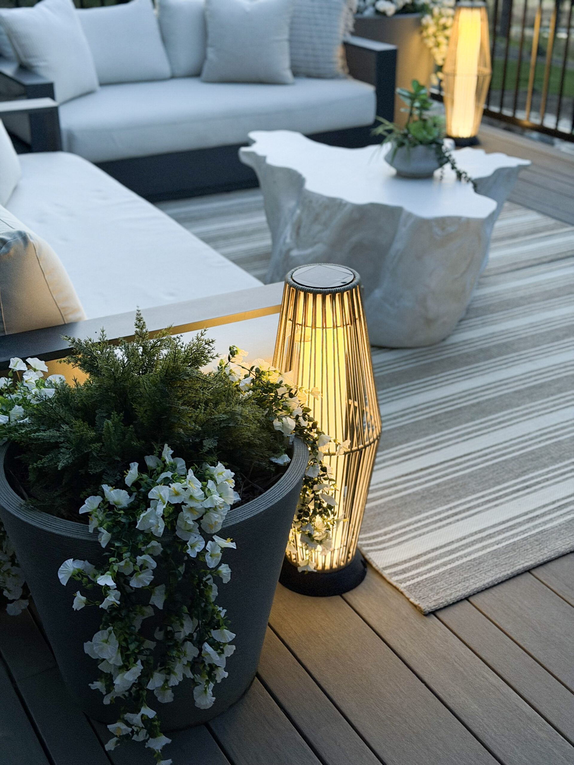 lanterns lit on a patio