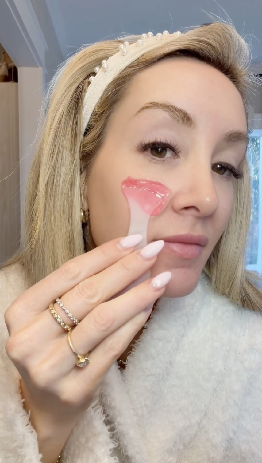 woman putting on jelly skincare mask