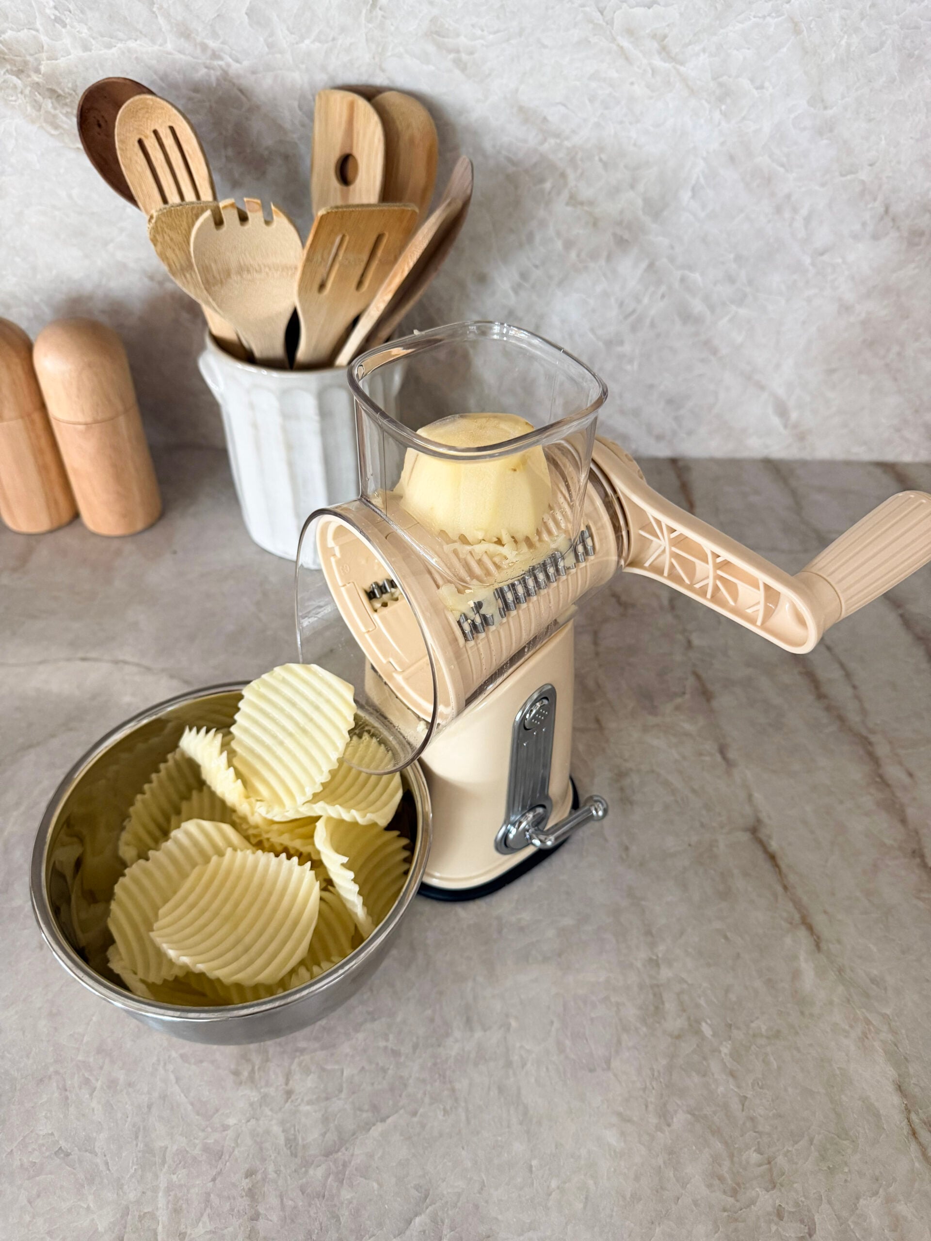 6-in-1 rotary grater on countertop