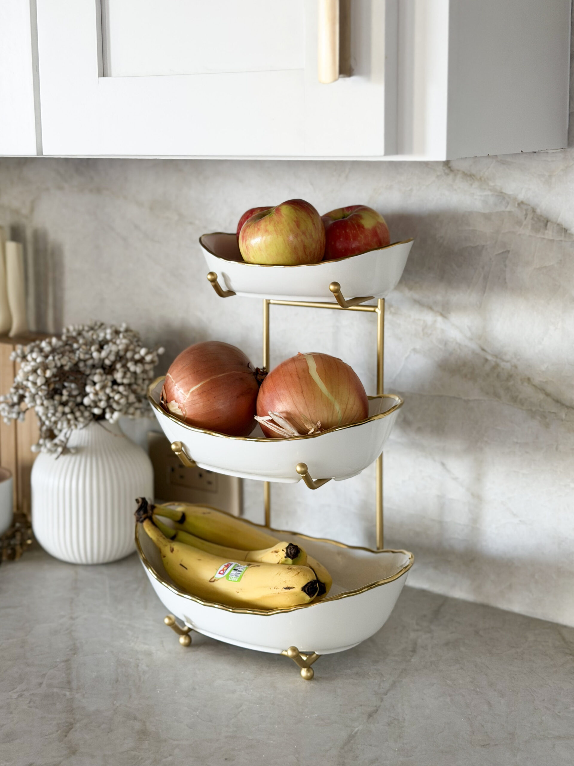 3-tiered fruit bowl on countertop