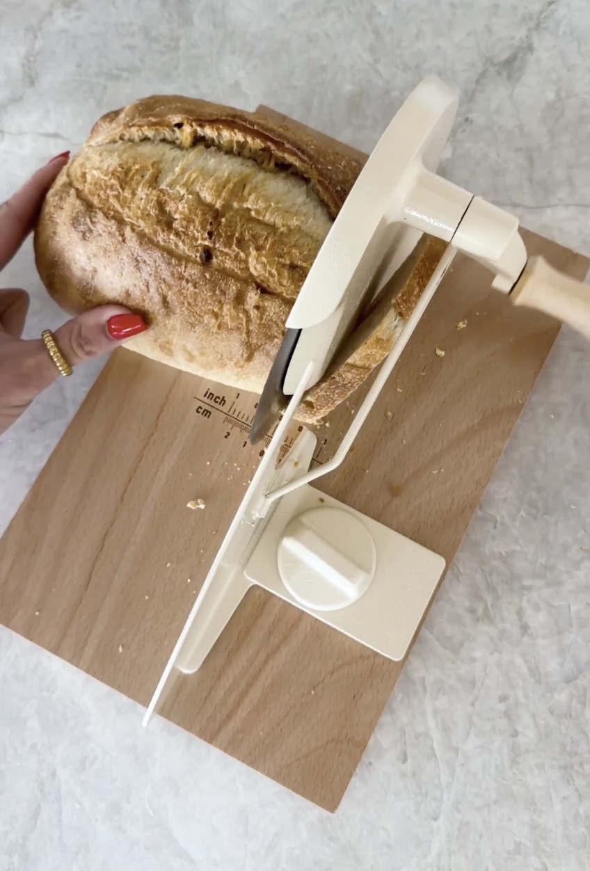 manual bread slicer on countertop