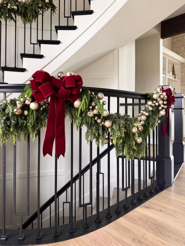 stair banister with holiday garland